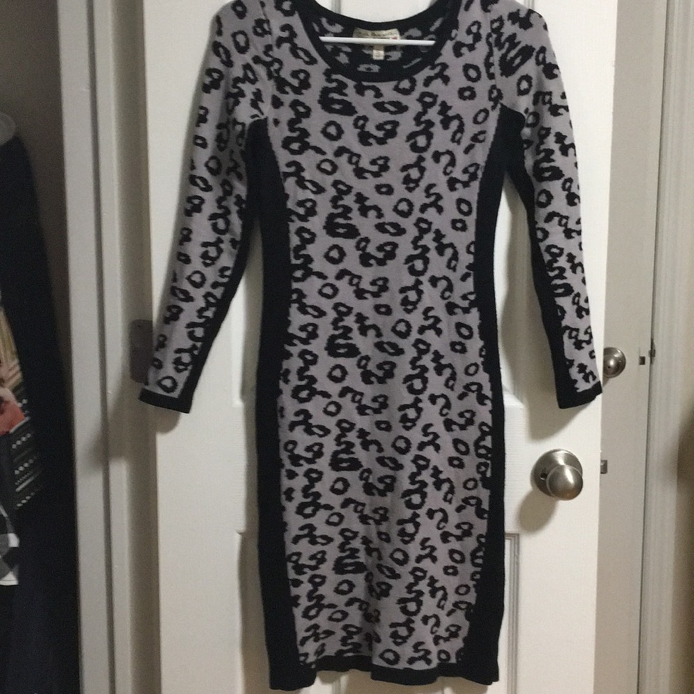 Women's form fitting cheetah print sweater dress